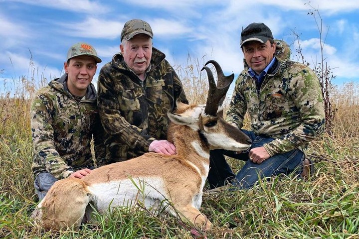 Minister Loewen with his father, Paul, and his son, Tyler.