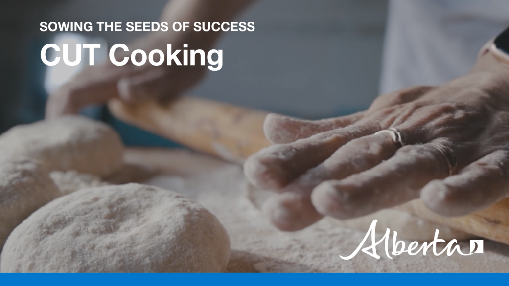 Photo of hand rolling dough