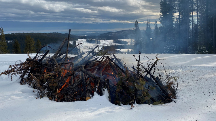 Safe burning of a woodpile